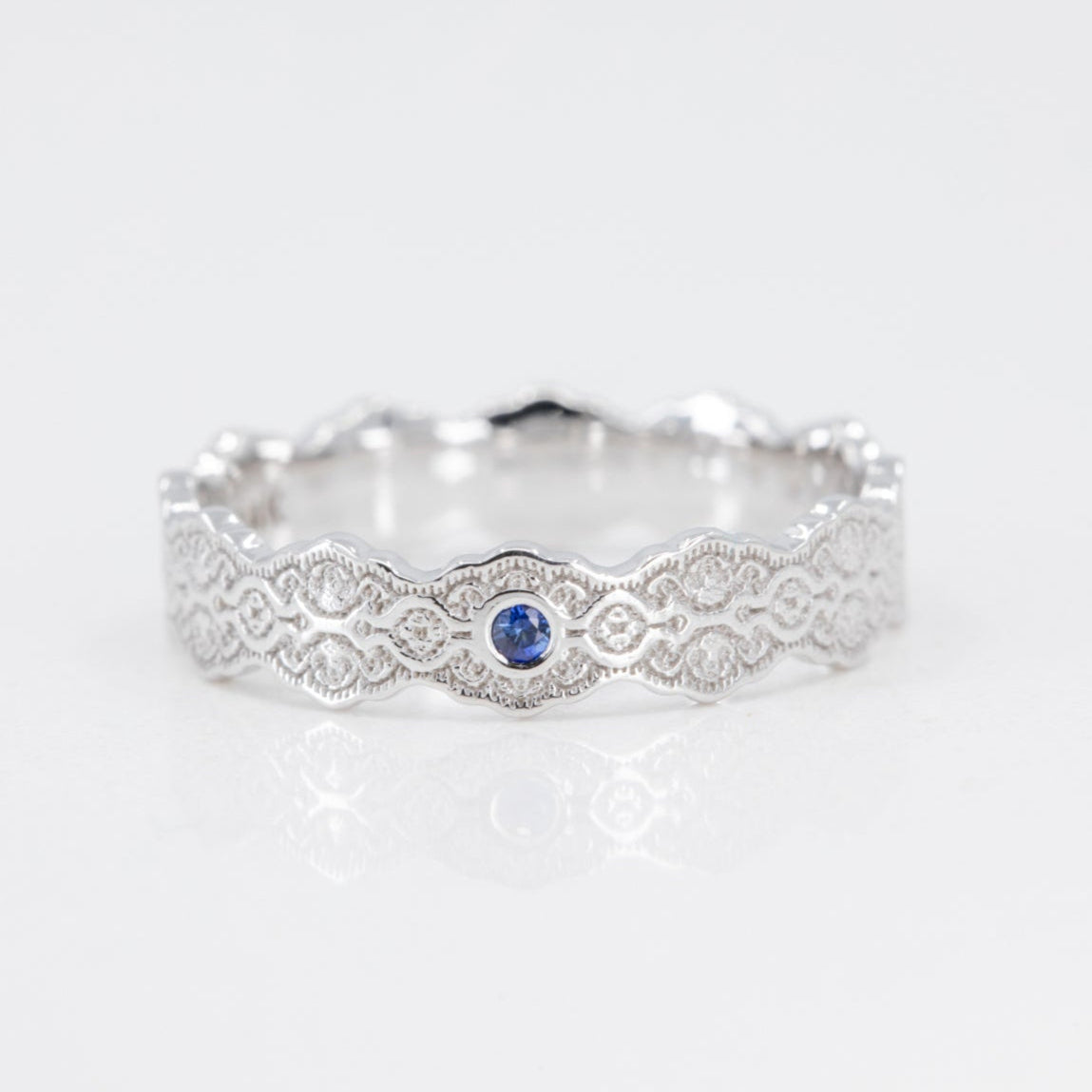 Aria Lace Wedding Ring with a Single Blue Sapphire in 14k Yellow Gold