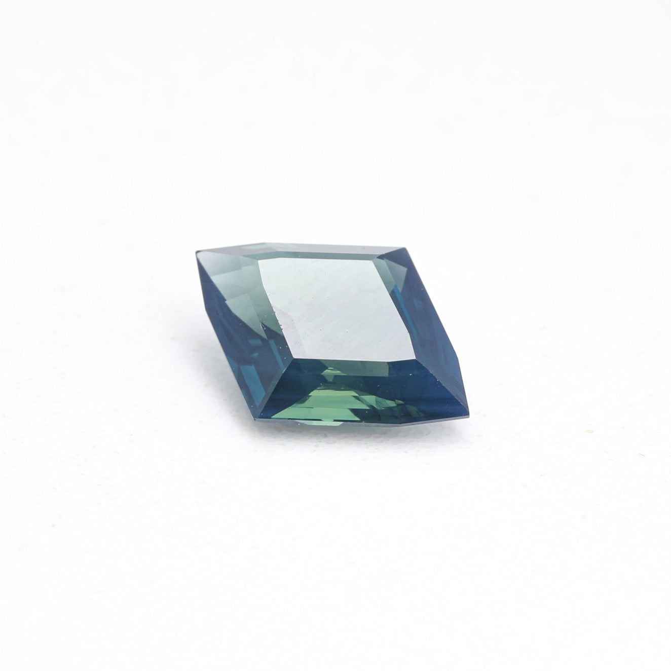 1.66ct Geometric Kite Shape Blue Green Opalescent Sapphire