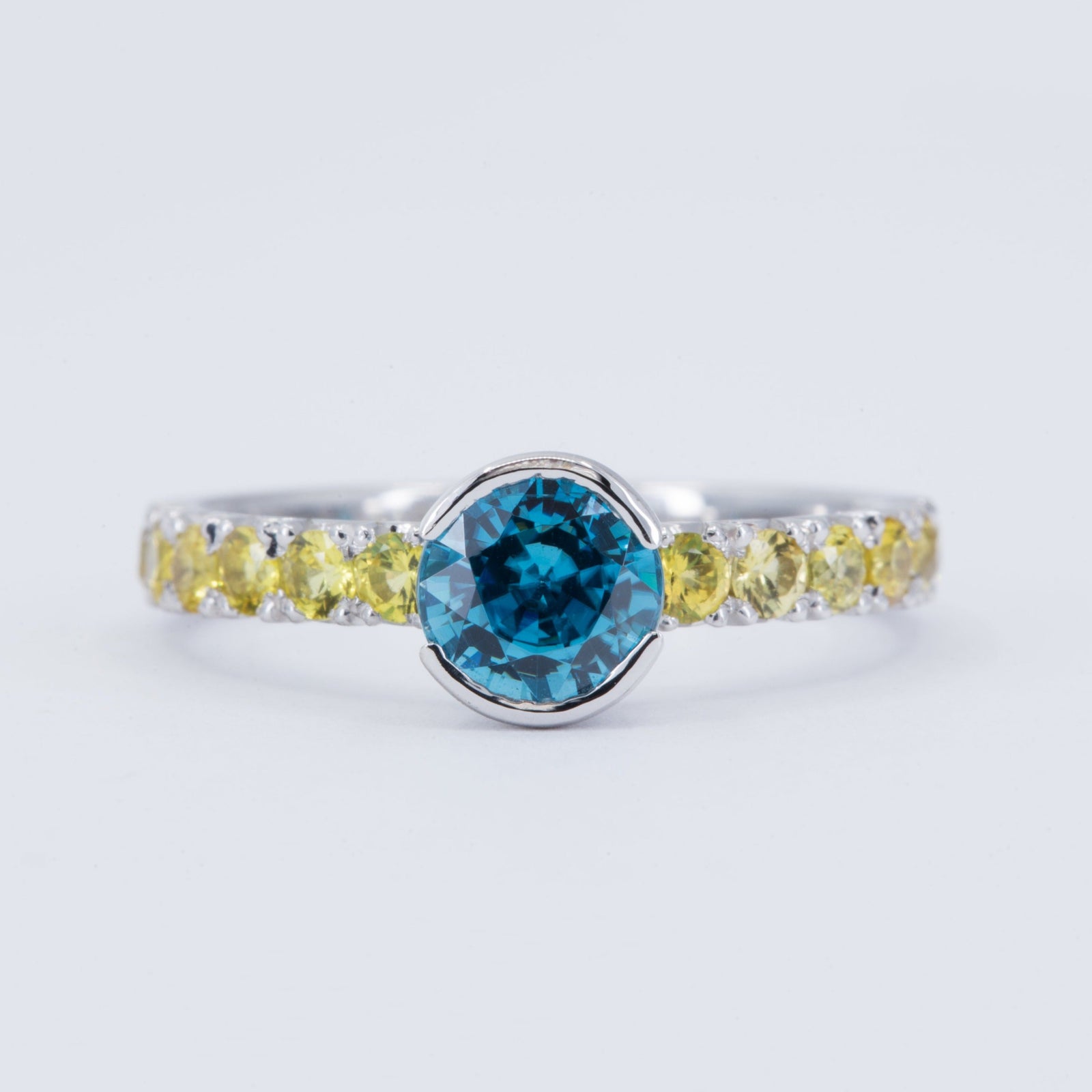 1.58ct Blue Zircon Engagement Ring with Yellow Sapphires