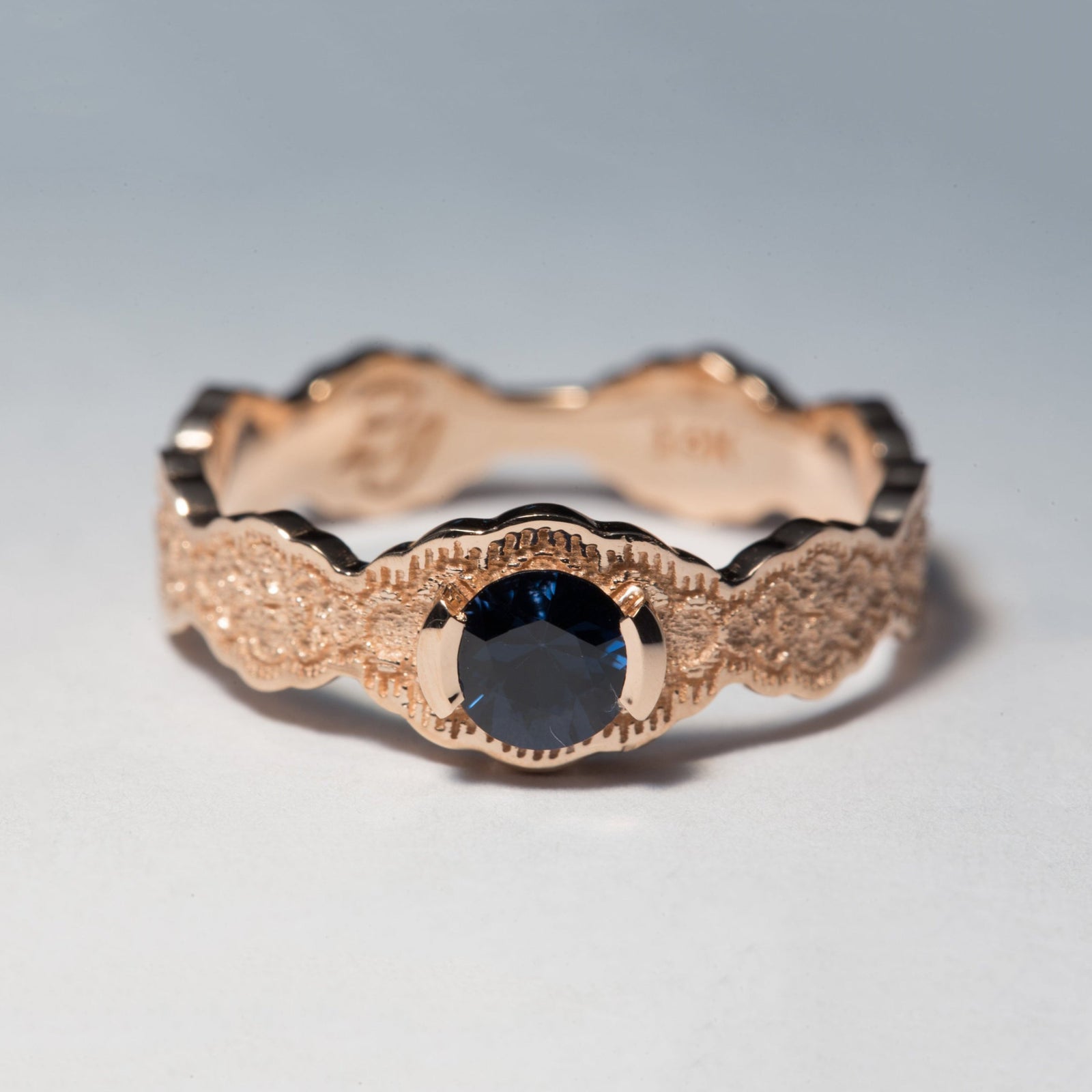 14K Rose Gold Lace Engagement Ring with a Dark Blue Spinel